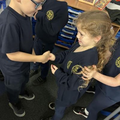 Investigating how far gems travel when we shake hands.