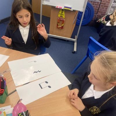 Miss West back in school for our music lessons.