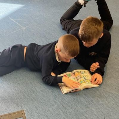 Year 6 serving the school.